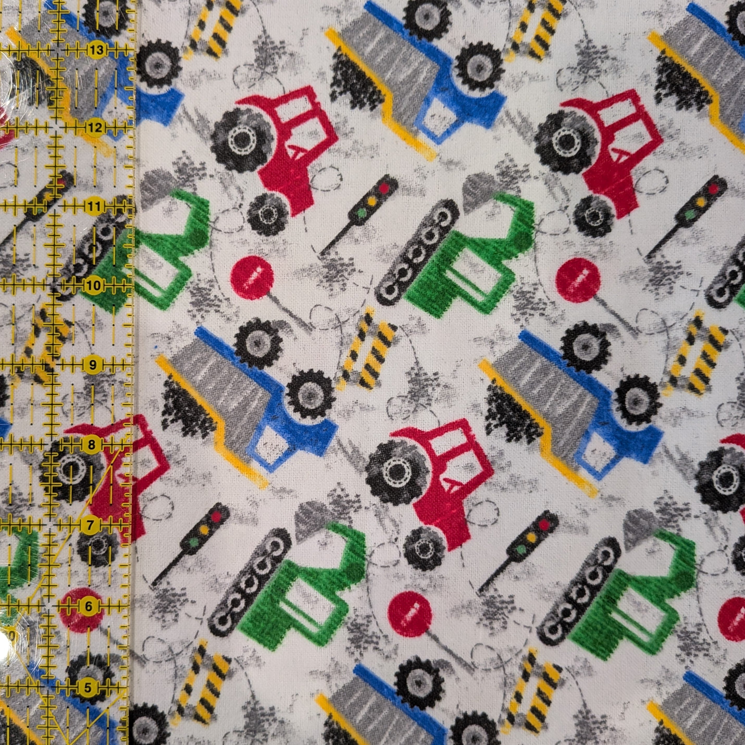 A.E. Nathan ~ CONSTRUCTION EQUIPMENT ~ FLANNEL ~ Gray ~ Sold by the 1/2 Yard