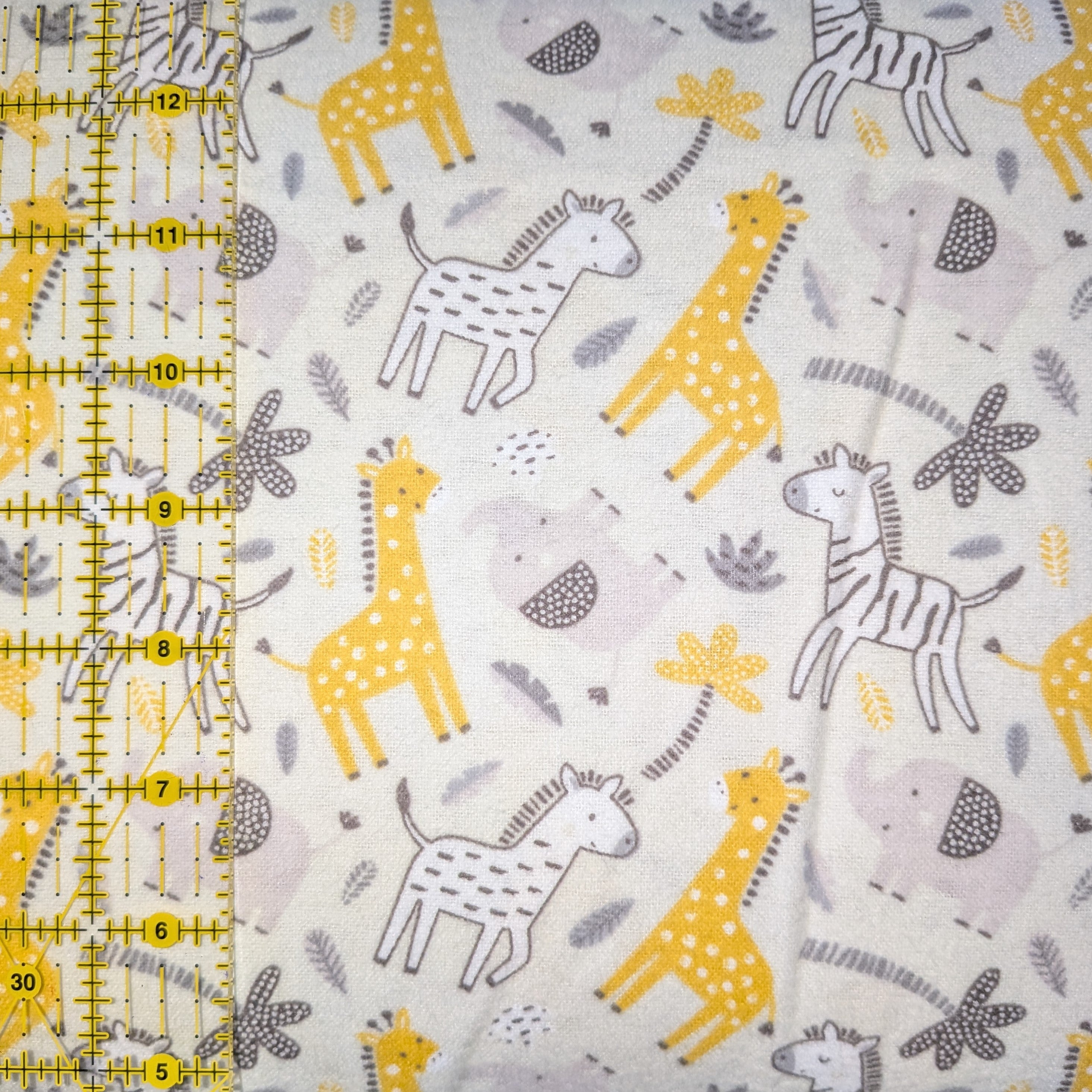 Camelot Fabrics ~ BUNGLE In The JUNGLE ~ FLANNEL ~  White, Yellow, and Gray ~ Sold by the 1/2 Yard