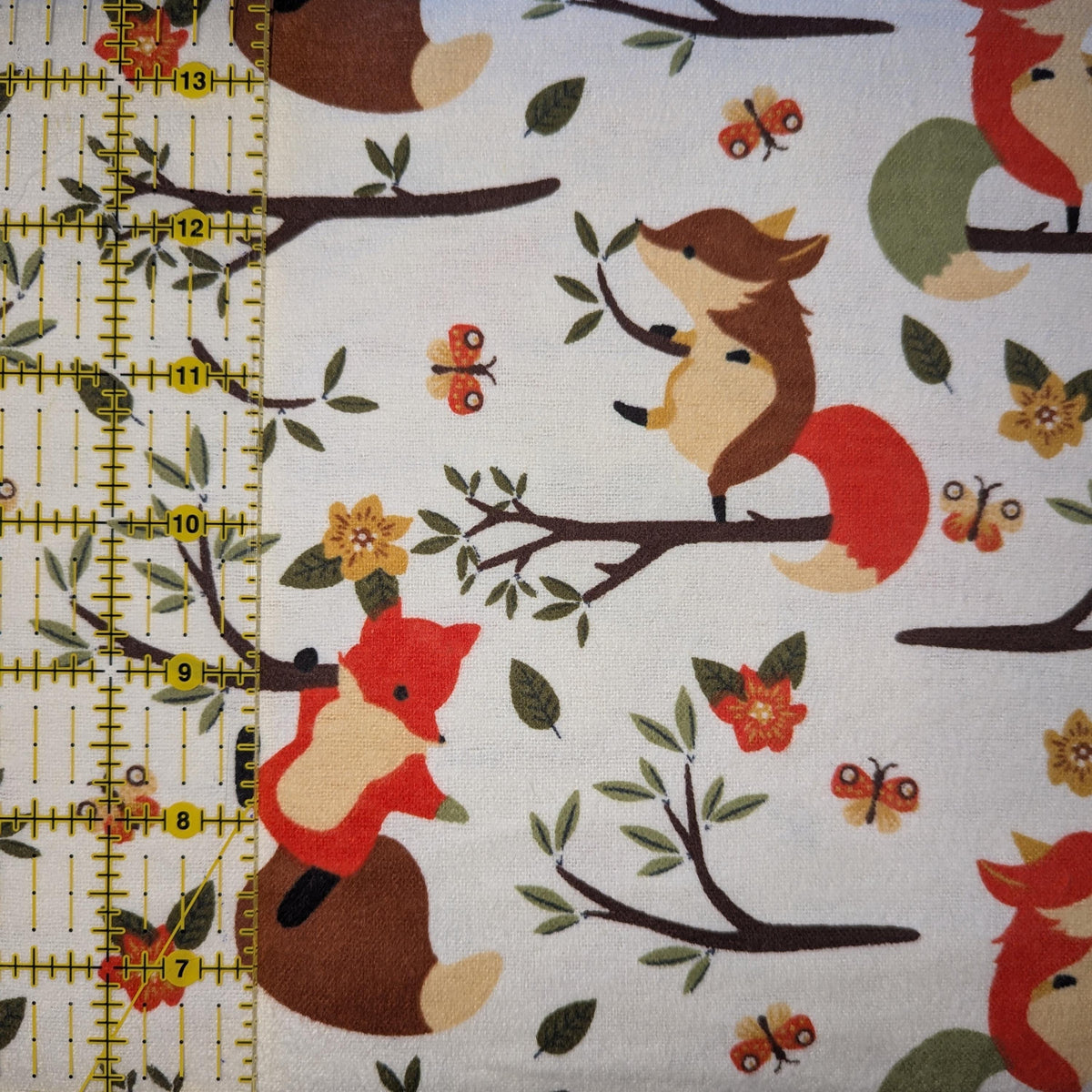 David Textiles ~ CLIMBING FOXES ~ FLANNEL ~ Cream ~ Sold by the 1/2 Yard