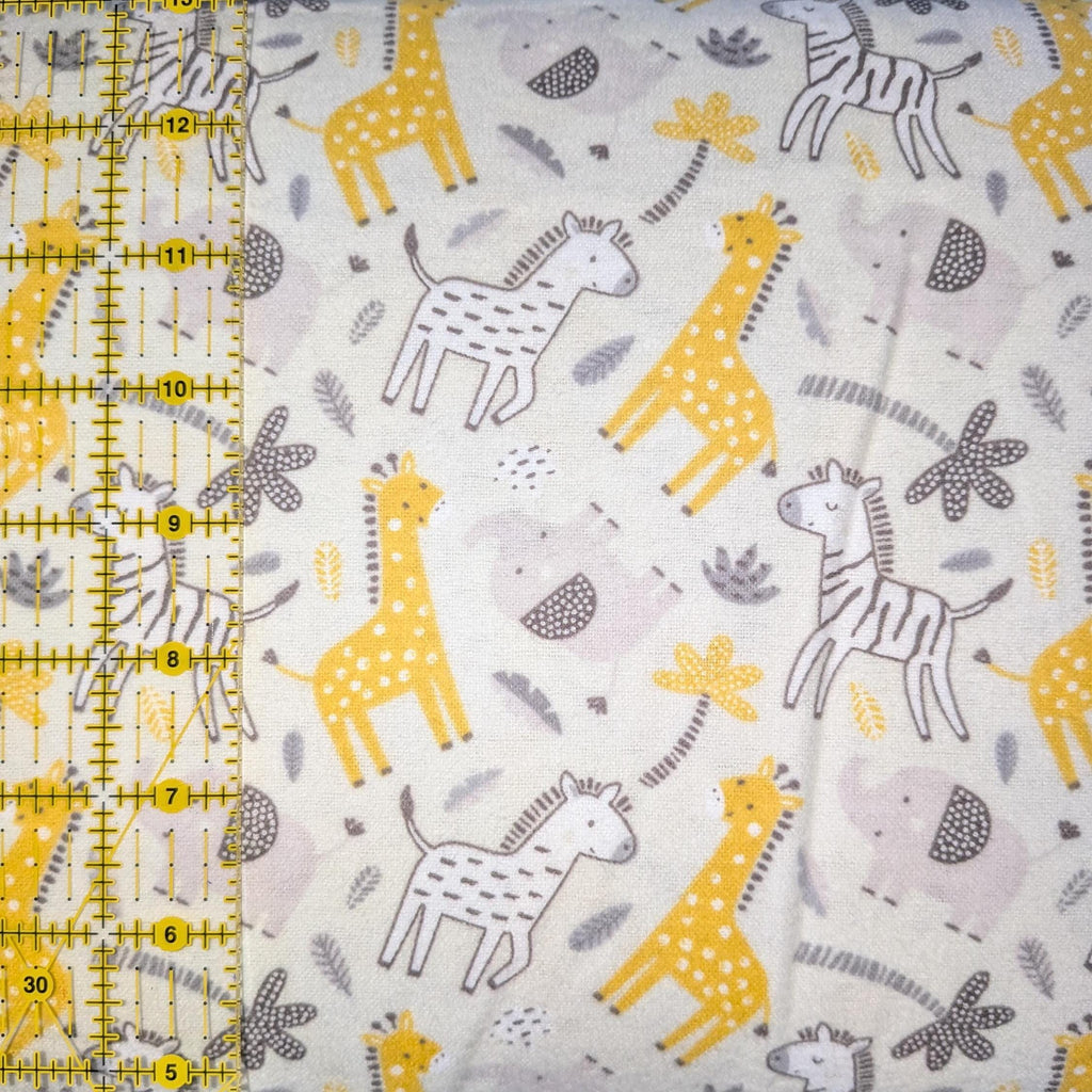 Camelot Fabrics ~ BUNGLE In The JUNGLE ~ FLANNEL ~ White, Yellow, and Gray ~ Sold by the 1/2 Yard