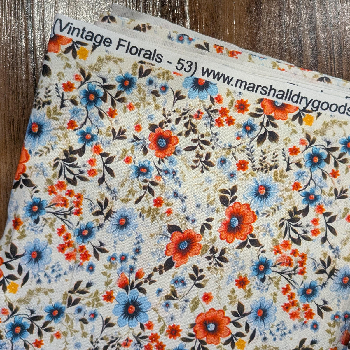 Marshall Dry Goods ~ VINTAGE FLORAL 53 ~ Reddish Pink, and Blue Flowers on Cream Background ~ Sold by the 1/2 Yard