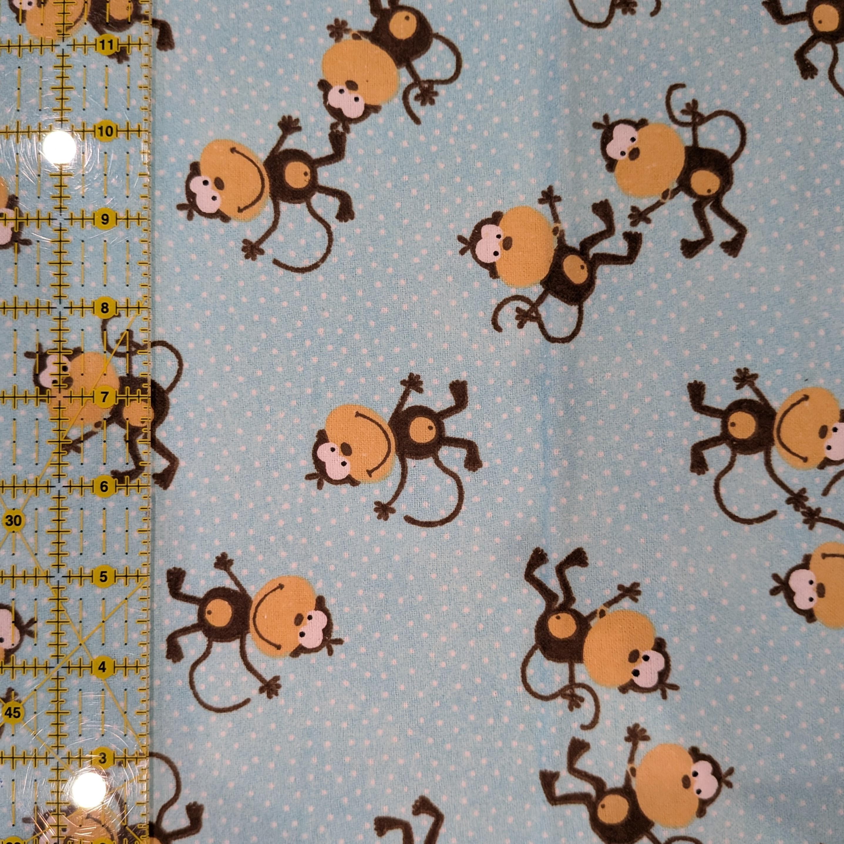 A.E. Nathan ~ TOSSED MONKEYS ~ FLANNEL ~ Aqua ~ Sold by the 1/2 Yard