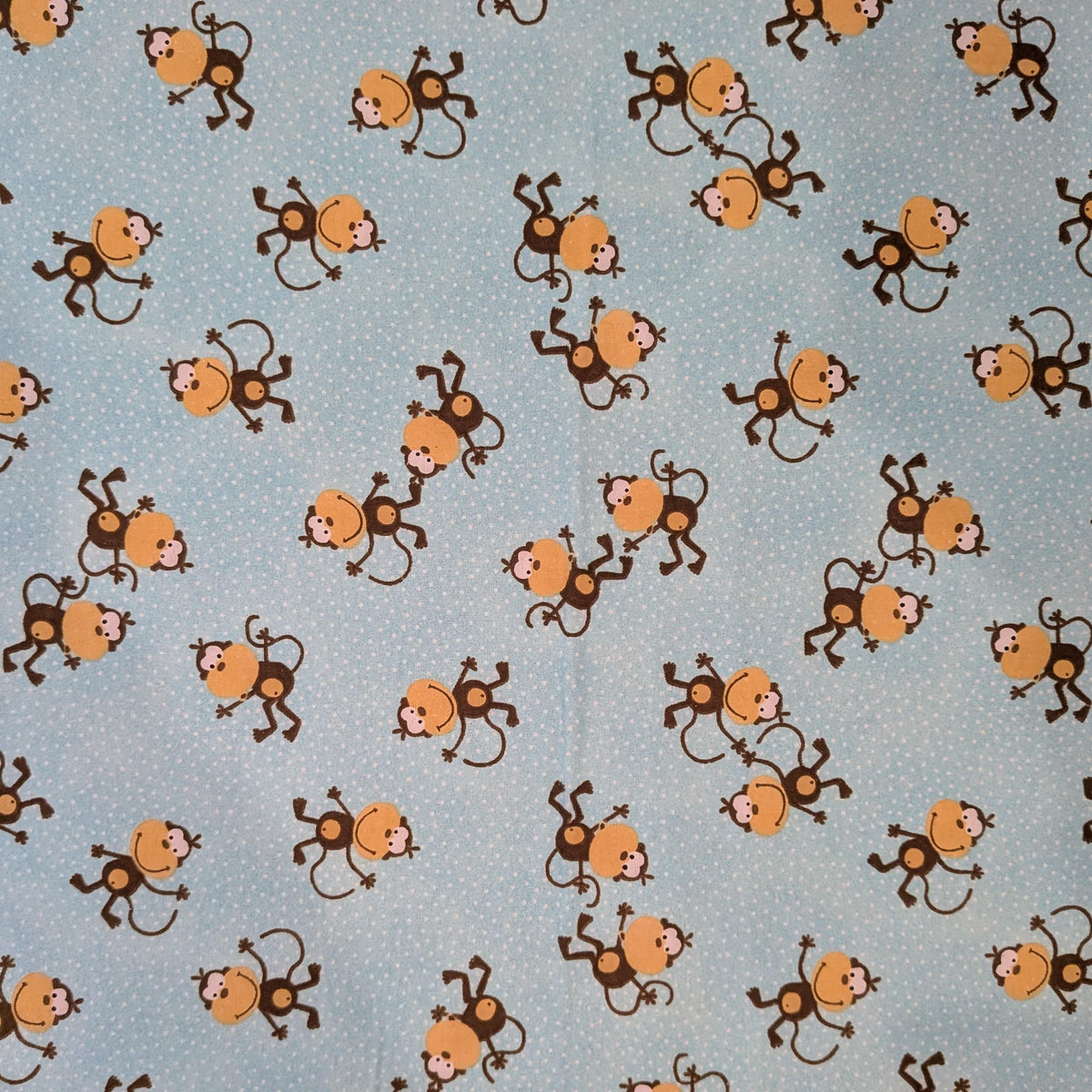 A.E. Nathan ~ TOSSED MONKEYS ~ FLANNEL ~ Aqua ~ Sold by the 1/2 Yard