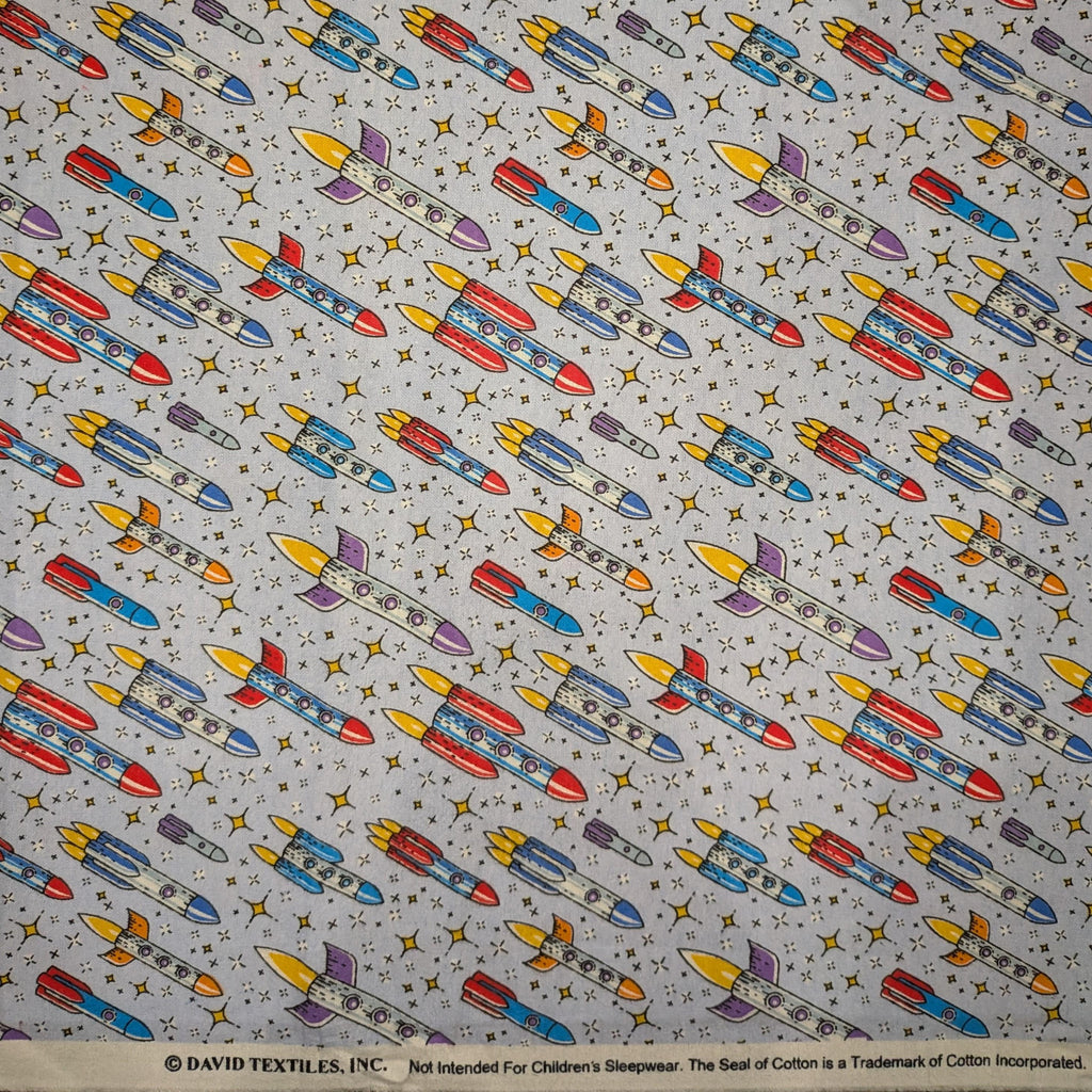 David Textiles ~ Up And Away ROCKETS ~ FLANNEL ~ Purple ~ Sold by the 1/2 Yard