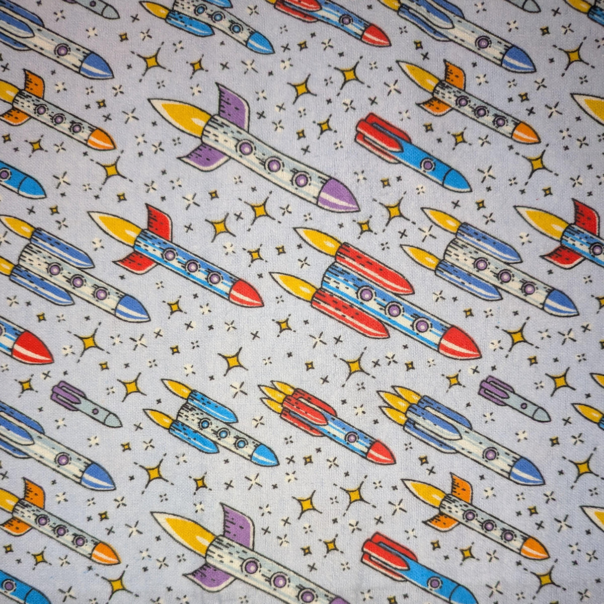 David Textiles ~ Up And Away ROCKETS ~ FLANNEL ~ Purple ~ Sold by the 1/2 Yard