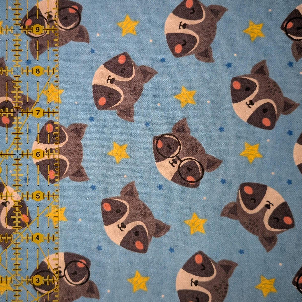 David Textiles ~ RACCOONS ~ FLANNEL ~ Blue ~ Sold by the 1/2 Yard