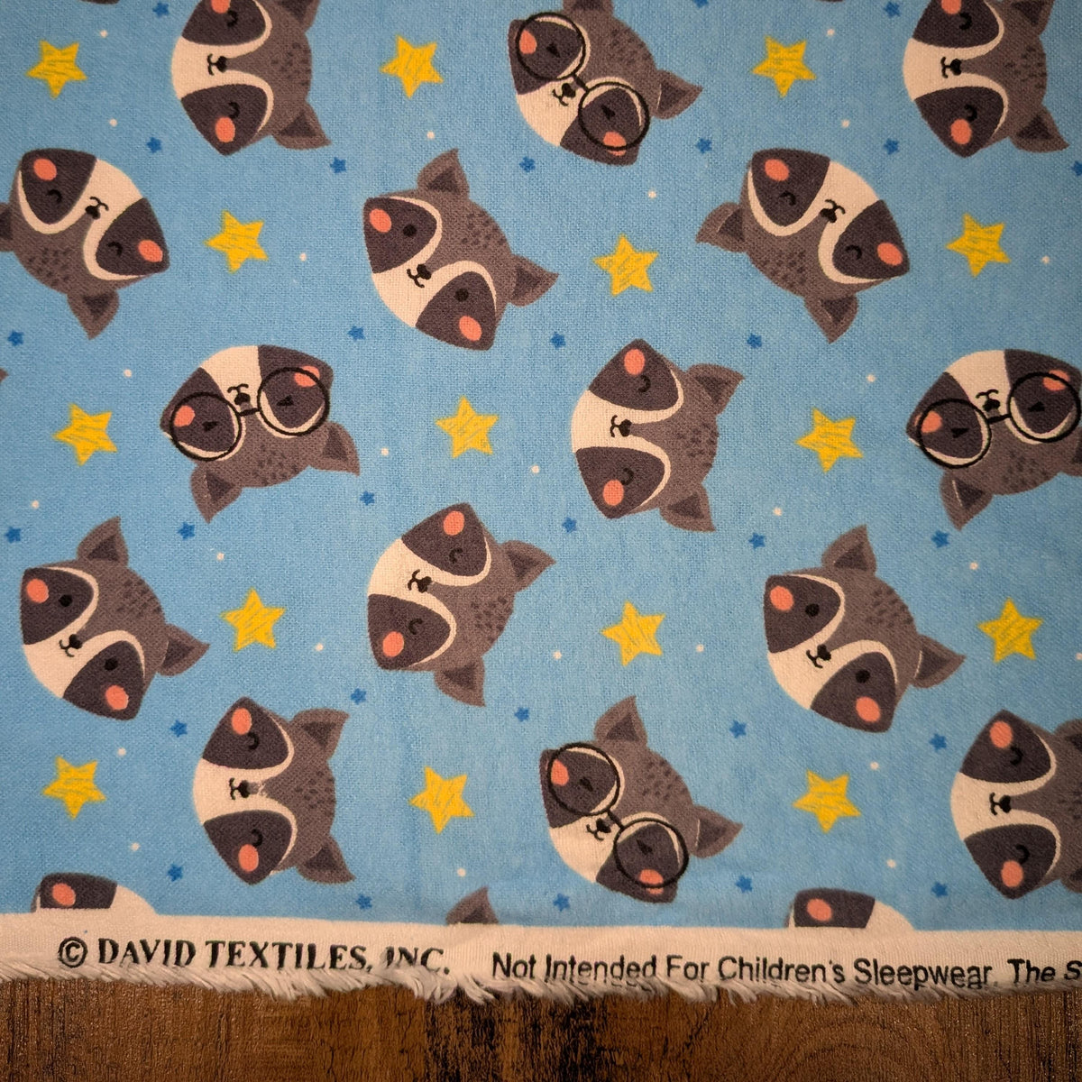 David Textiles ~ RACCOONS ~ FLANNEL ~ Blue ~ Sold by the 1/2 Yard