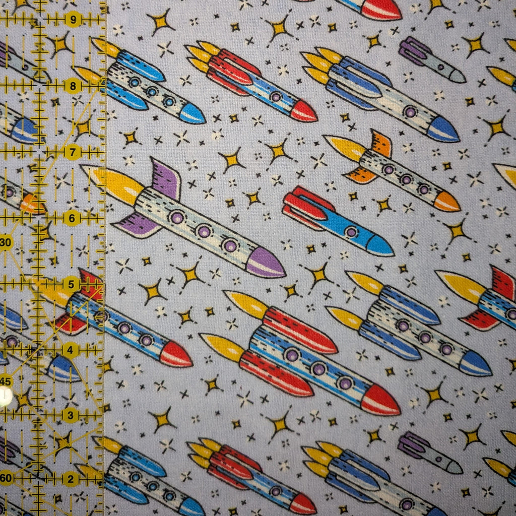 David Textiles ~ Up And Away ROCKETS ~ FLANNEL ~ Purple ~ Sold by the 1/2 Yard