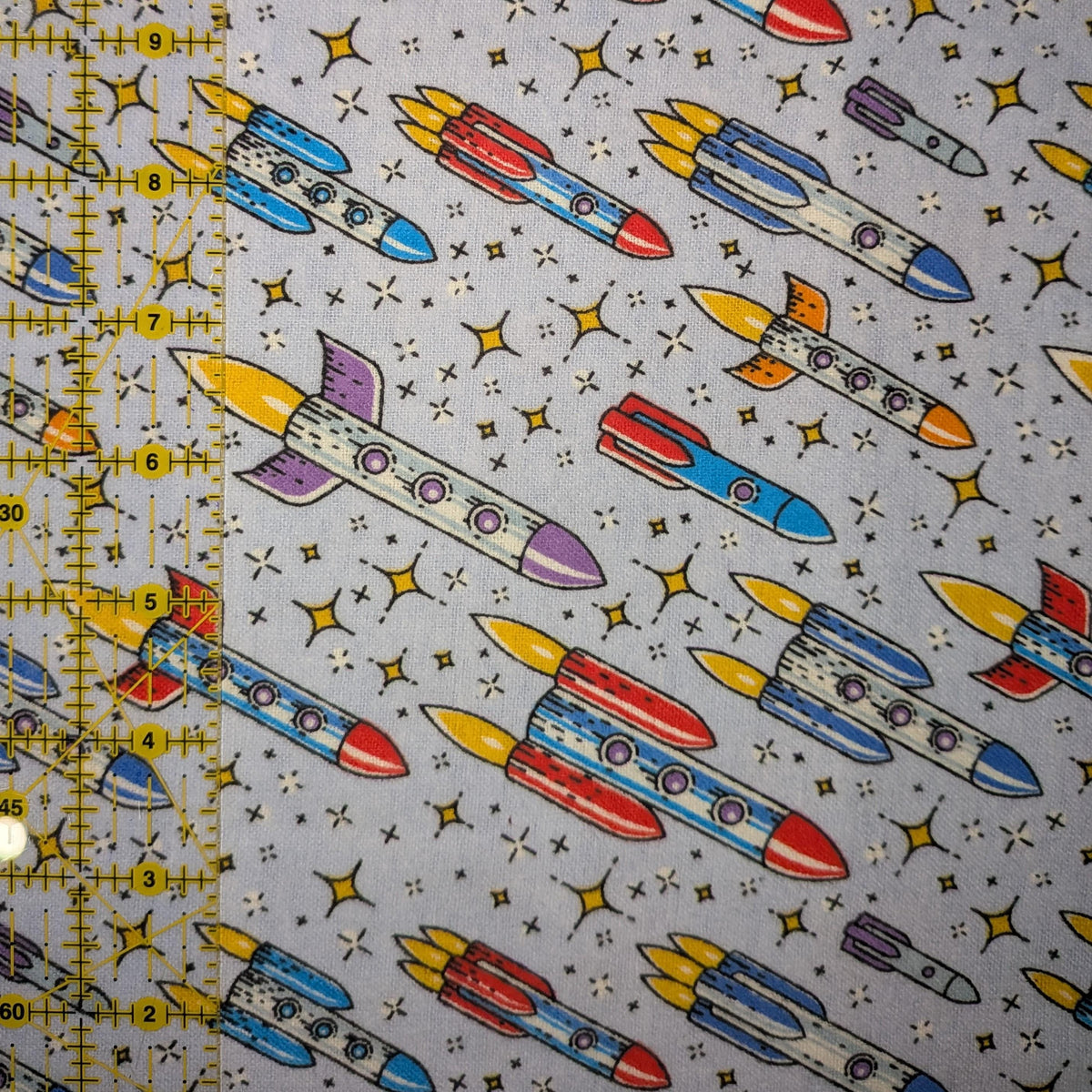 David Textiles ~ Up And Away ROCKETS ~ FLANNEL ~ Purple ~ Sold by the 1/2 Yard