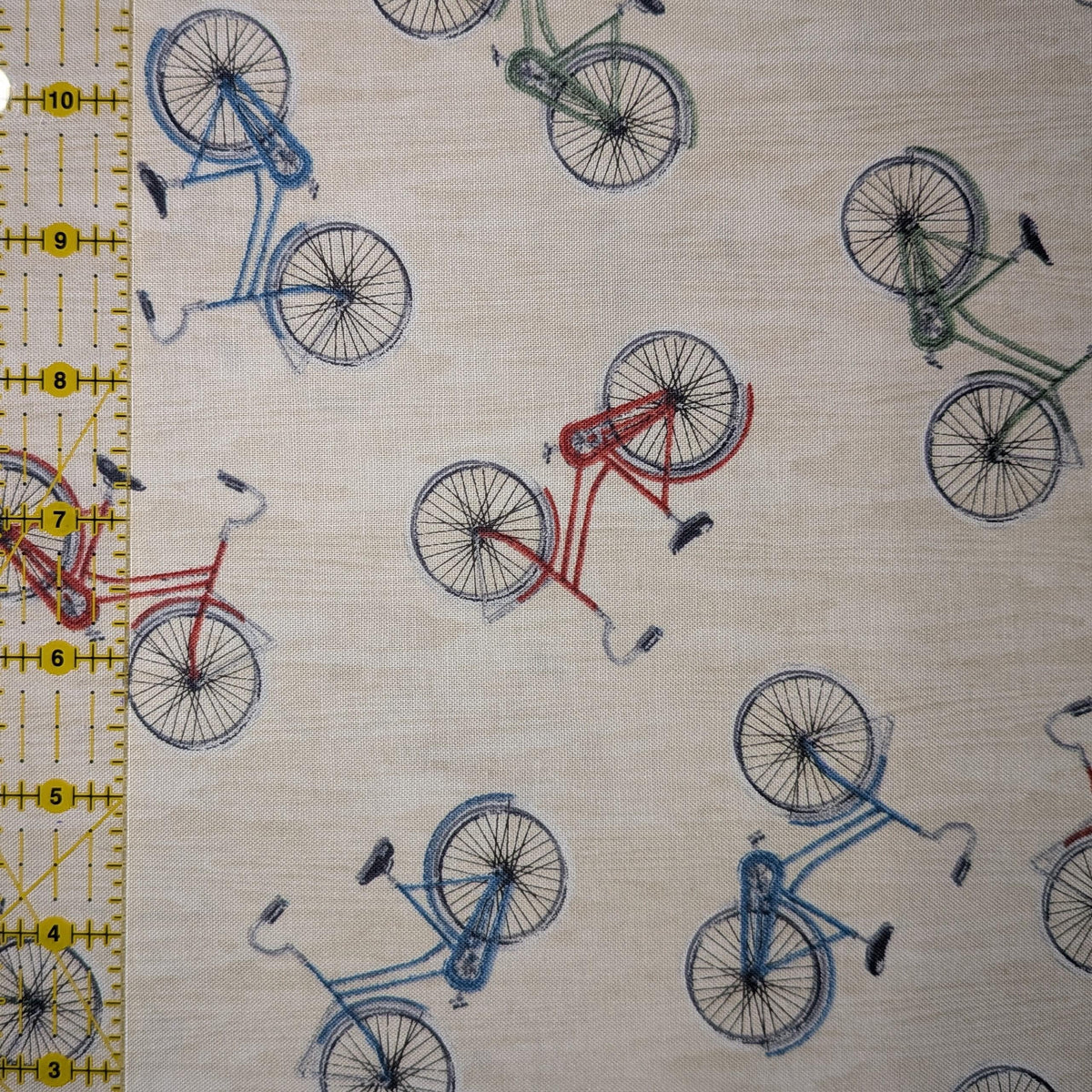 Wilmington Prints ~ Evergreen Escape ~ BIKE TOSS ~ Sand or Sage ~ Sold by the 1/2 Yard