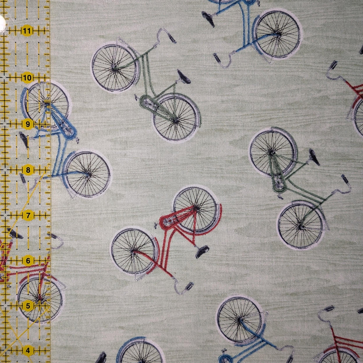 Wilmington Prints ~ Evergreen Escape ~ BIKE TOSS ~ Sand or Sage ~ Sold by the 1/2 Yard