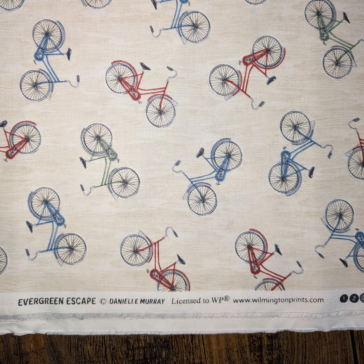 Wilmington Prints ~ Evergreen Escape ~ BIKE TOSS ~ Sand or Sage ~ Sold by the 1/2 Yard